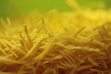 Pile of homemade thin noodles for soup.