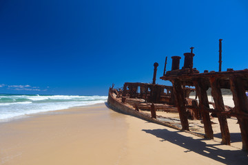 Wreckage on the beach outside the water