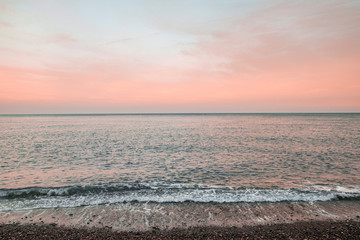 Dreamy Beach Sunset With Pastel Blush Pink Color Clouds And Turquoise Ocean Waves