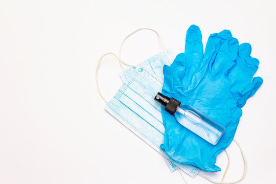 Mask, Gloves, Sanitizer Isolated On White Background