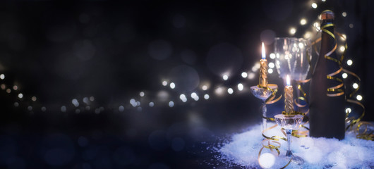 New years eve celebration background with champagne, Christmas and New Year holidays background, winter season.