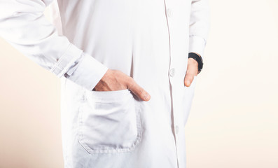 Doctor standing with hands in pocket