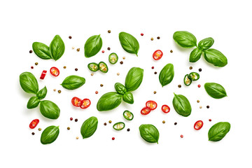 Basil, spices, chili pepper. Vegan diet food, creative green basil composition isolated on white. Fresh basil pattern layout, cooking concept, top view.