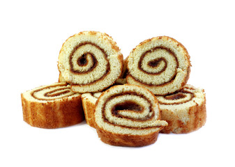 Swiss sweet roll with jam isolated, slices of homemade sponge roll cake isolated