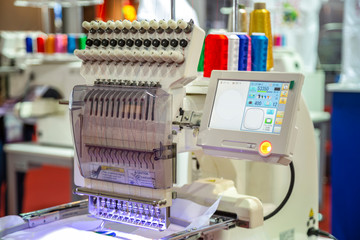 Single-head, 15-needle Table Embroidery Machine.