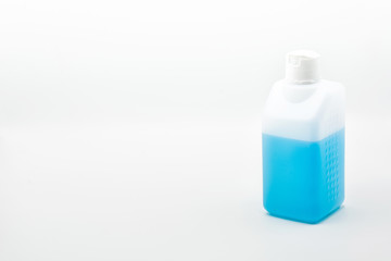 Alcohol disinfectant gel bottle isolated on white background. Copy space