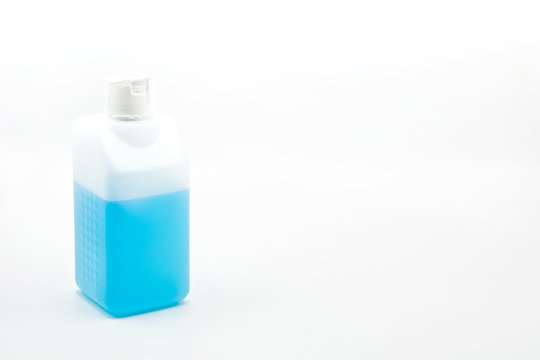 Alcohol disinfectant gel bottle isolated on white background. Copy space