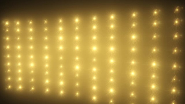 Yellow blink bright flood lights backgrounds. VJ LED Lights Flashing Spotlight Wall on stage. For your club, concert, dance, disco, and media.
