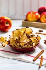 Baked Cinnamon Red Apple Chips. Selective focus.