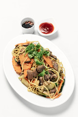 traditional khmer beef stir fry with egg noodles in cambodia