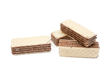 Crispy wafers with creamy hazelnut filling isolated on white background