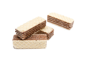 Crispy wafers with creamy hazelnut filling isolated on white background