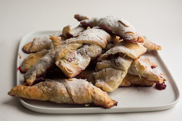 step by step cooking croissants with cherries. 