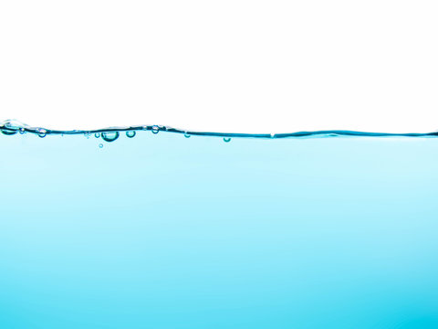 Water and air bubbles over white background.