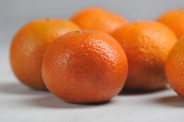 tangerines on a gray background