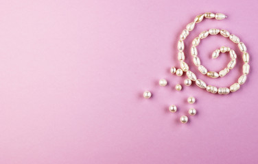 pearl jewelry on a purple background