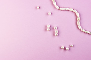 pearl jewelry on a purple background