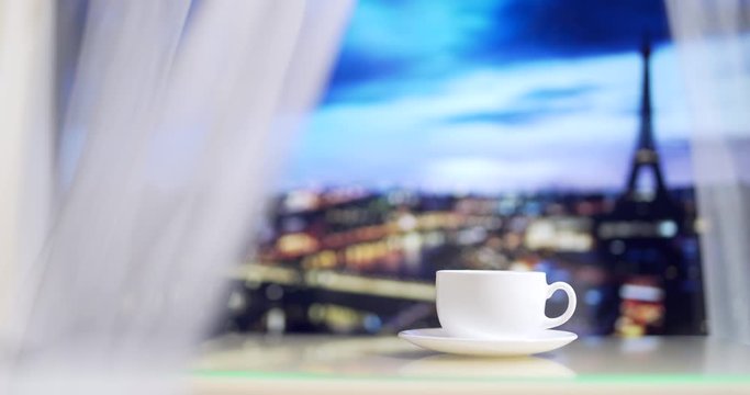Eiffel Tower from the hotel window. Coffee on white table on evening Paris background. Travel to Paris. Honeymoon. Restaurant near the Eiffel Tower. With closeup. 4K