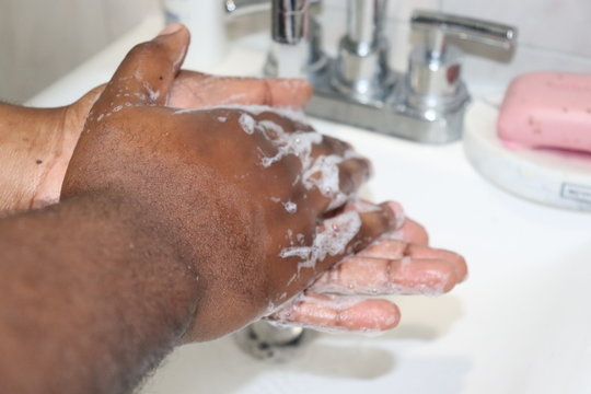 Man washing hands with soap
