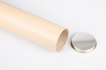 empty brown open card board roll tube over white background