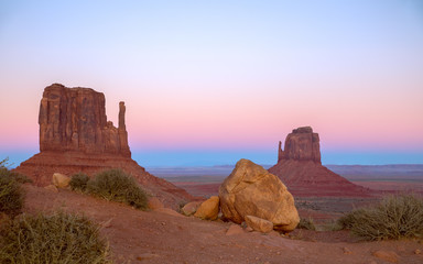 Beautiful sunset over famous Buttes of Monument Valley on the border between Arizona and Utah, USA
