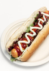 classic hot dog with frankfurter sausage and sauces