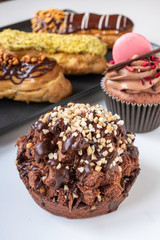 beautiful and delicious cakes, muffins, eclairs, macaron cookies
