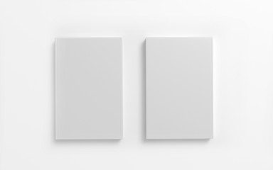 2 books with blank white hardcover isolated on white as template for your design presentation, promotion etc.