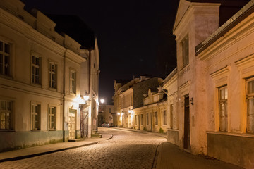 Night winter view of the old buildings in the historical part of Tallinn. The city is the capital and the most populous city of Estonia.