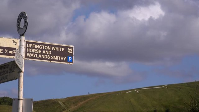 Sign post pointing to the white horse of Uffington UK England 4K