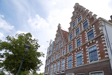 Fototapeta premium Beautiful buildings of a street of Haarlem, The Netherlands