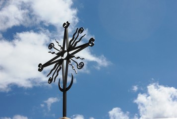 Ethnic cross with symbols