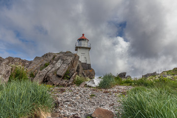 The remains of a whale next to a lighthouse in Norway.