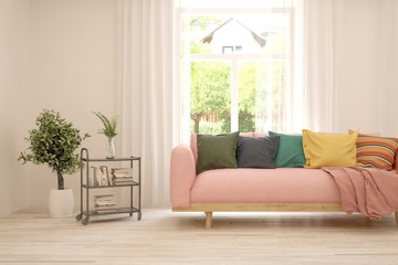 White living room with sofa and summer landscape in window. Scandinavian interior design. 3D illustration