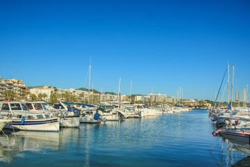 Busy harbour with boats in Port de Alcudia, Mallorca, Spain