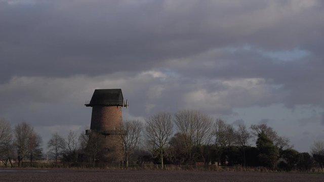 England countryside with windmill and winter scene UK 4K