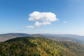 Puffy White Cloud Over a Catskill Mountain in Autumn - 332723069