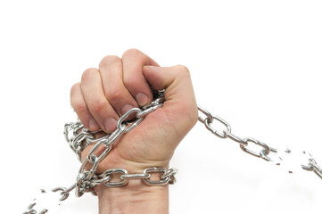 a man's hand in a chain breaks the chain on a white background.