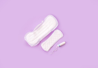 Clean pads for periods, tampon, on a light background. The female period of the period.