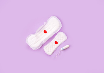 Clean pads for periods, tampon, on a light background. The female period of the period.