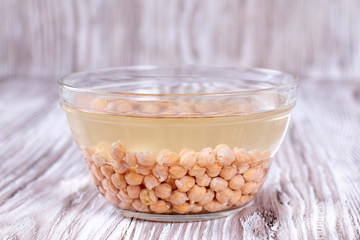 Chickpeas soaked in water in a bowl