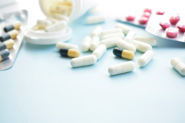 Assortment of medicinal pharmaceutical products, tablets, pills, capsules. Concept of healthcare and medicine. treatment of viruses. Space for text.