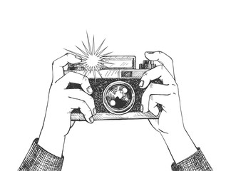 Man taking photo on vintage camera