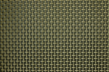 Woven wire mesh with a black background