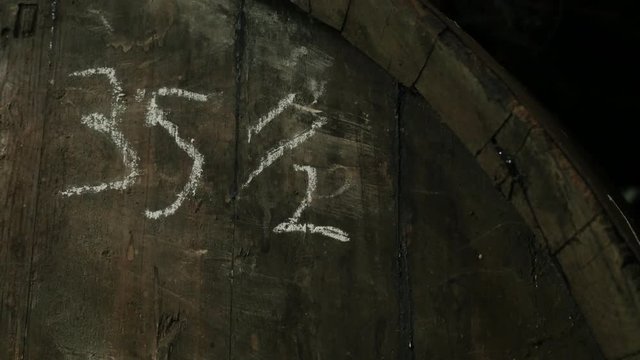 Chalk numbers in Barrels of fine wine in a winery of the Denomination of Origin Montilla Moriles