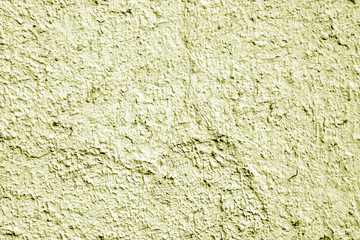 Painted cement wall background in yellow color.