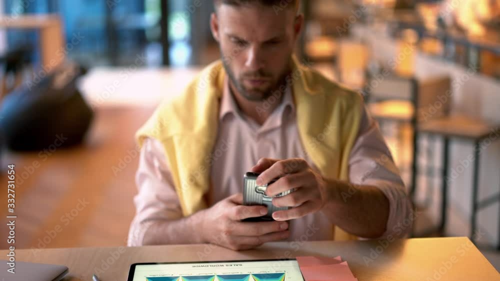 Aufkleber caucasian man in smart casual clothing using cellphone gadget with high speed internet connection fo