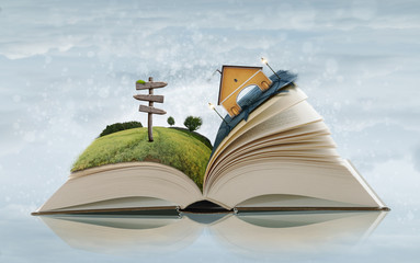 Open Paper Book with Abstract Story - Signpost on Field and House on Asphalt Road with Sky on Background