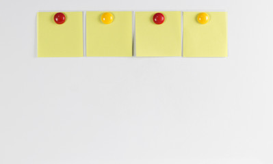 paper post-it notes on a white background