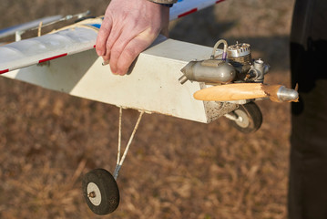 RC airplane with a broken propeller, close-up.